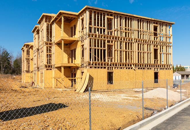 a snapshot of temporary chain link fences protecting a large construction project from unauthorized access in Rancho Santa Margarita CA